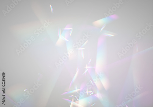 фотографія Diamond rainbow prism glows with crystal neon light over glass glitter in sun rays