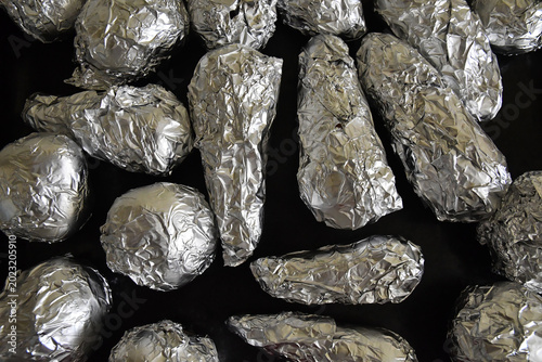 Carrots and beets wrapped in foil before baking