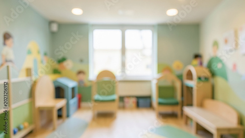Pediatric clinic waiting area design featuring soft green walls and natural light