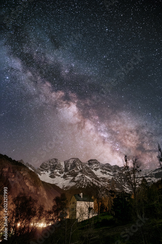 The Milky Way passing over a snow covered Cirque de Gavarnie in the French Pyrenees