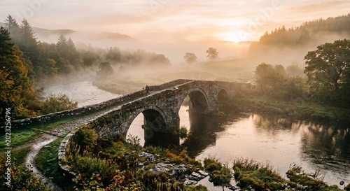 Morning Mist Over Stone Bridge and River