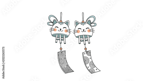 Pair of cute Japanese wind chimes shaped like cats with swirling patterns on the paper slips hanging from the bottom on a white background.