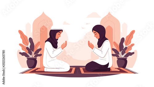 Two Muslim women dressed in traditional white and black clothing kneeling on prayer rugs while performing their daily spiritual prayers.