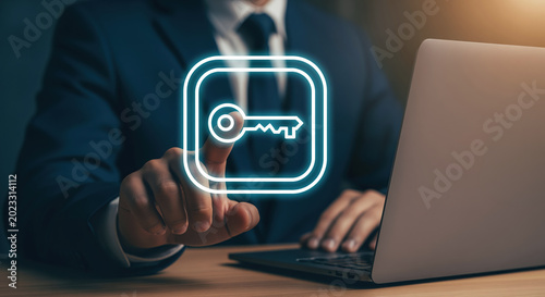 Problem solving strategy illustrated by glowing key icon above laptop as a visual for task resolution, decision making, workflow unblock and finding the right answer in office work