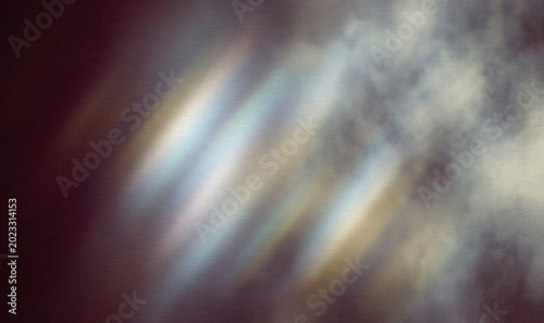 Cinematic light leaks on dark background, ethereal lens flare with soft smoke texture, abstract prism light rays for overlay and film effects