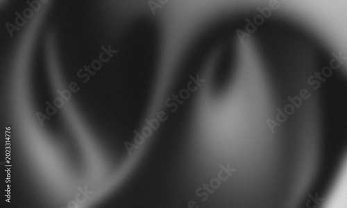 Abstract black and white silk texture, elegant dark liquid waves, minimalist monochrome gradient background for luxury branding and web design