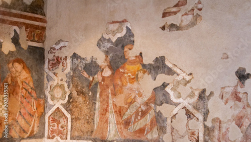 Ancient frescoes reveal stories of love, devotion, and culture within a historic chapel