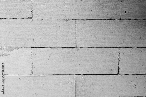 White lightweight concrete block wall background. Light aerated concrete masonry texture.