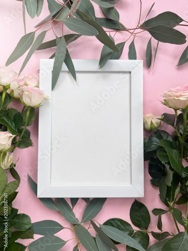 white frame mockup with pink roses on pastel background