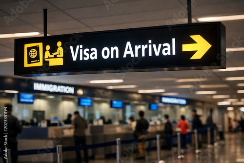 Visa on Arrival Sign Directing Travelers at Airport Immigration