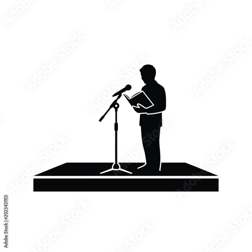 Foto Man speaking on a microphone stage.