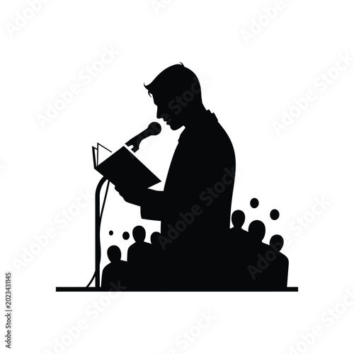 Photos Man speaking into a microphone.