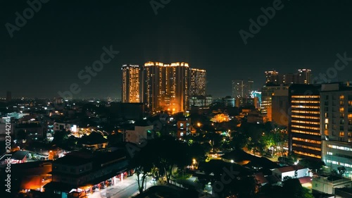 Aerial Night View of Illuminated Hotels and Commercial Skyline in Medan, North Sumatra, Indonesia