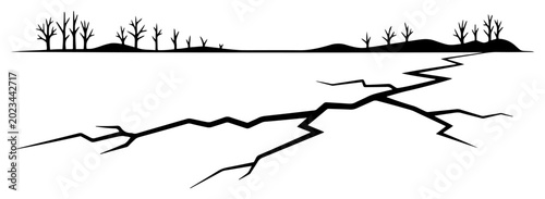 Photos Cracked dry ground landscape with dead trees for drought and environmental crisi