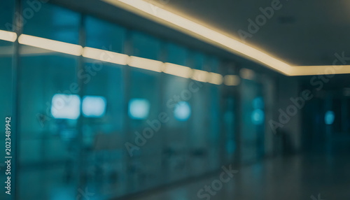 Defocused realistic photograph, modern hospital corridor at night