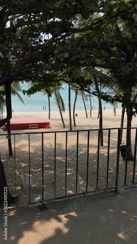 View of Tien Sa Beach in Da Nang, people walking on the beach