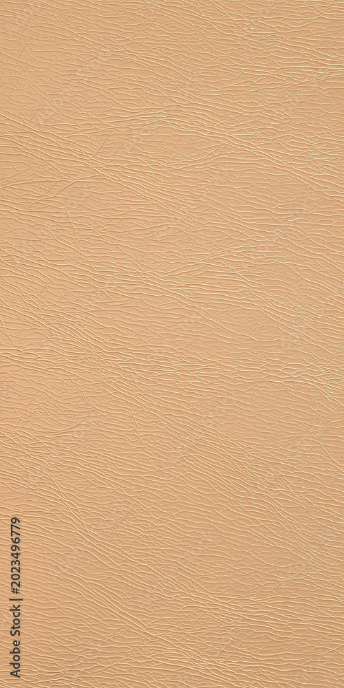Fototapeta premium Plain tan leather texture background close up