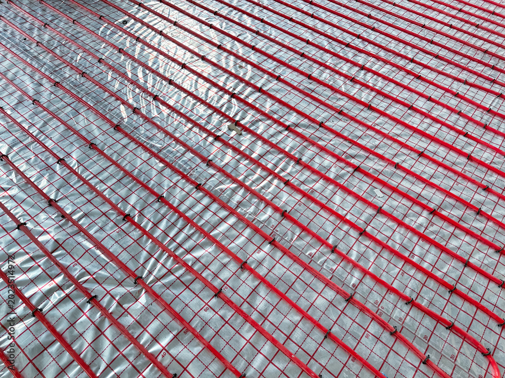 Fototapeta premium Installation of underfloor heating system in building, above view