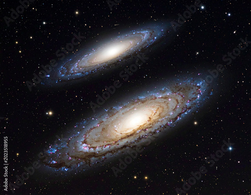 Galaxies in the night sky with bright stars and swirling patterns seen from Earth