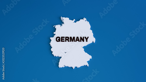 Germany 3D Map Model with Bold Text Label on Blue Background — 3D Render of White Geographic Map of Germany for Political, Business, Travel and Editorial Design Concepts
