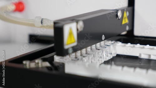 Medical hospital laboratory equipment for identifying virus and disease. Healthcare . Clinical blood analyzer of human bio sample. Automated process in biochemistry analyzer. 4 k video