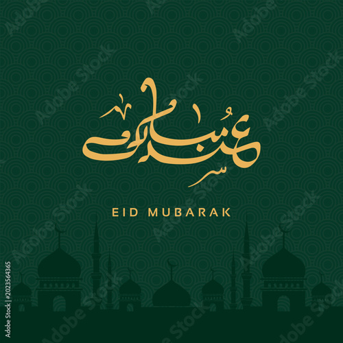 Golden arabic calligraphy eid mubarak with mosque silhouette on green pattern background