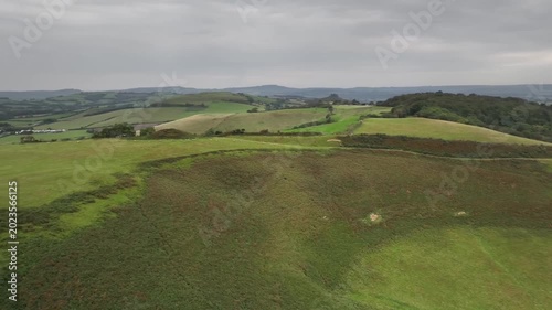 Aerial Drone Footage of Rolling Green Hills and Pastures in Beautiful Dorset Countryside England