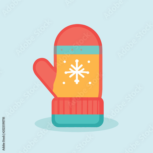 Tableau sur toile Colorful winter mitten with snowflake design.