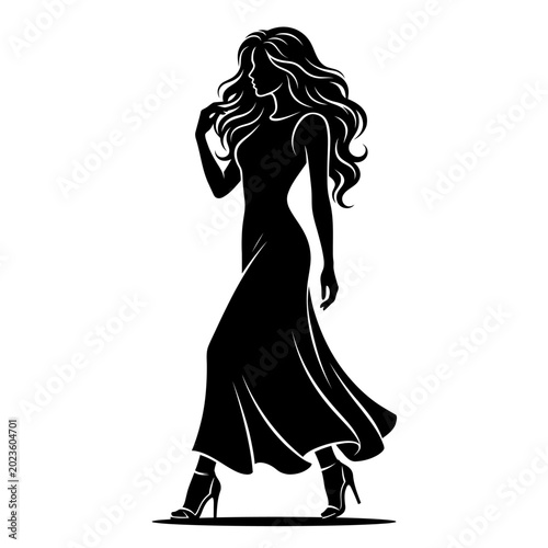 Foto Alluring Woman Walking Elegantly and Touching Hair in a Flowing Dress on Light B