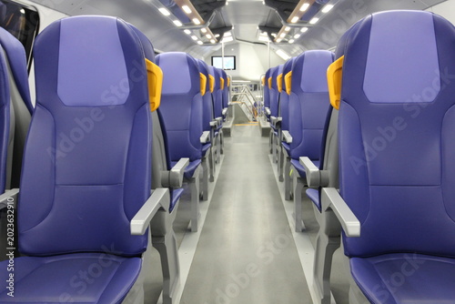 Фотография Upper deck seats on an express train stopped at Venice Santa Lucia Station in Ve