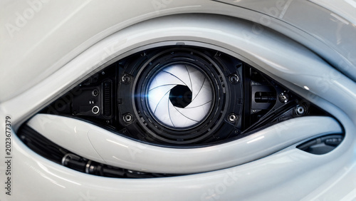 A close-up futuristic AI robotic eye with camera aperture iris in glossy white casing symbolizes modern AI surveillance and advanced tech