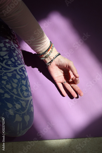 Woman's Hand in Gyan Mudra close up. Spirituality and Inner Transformation from Darkness to Light