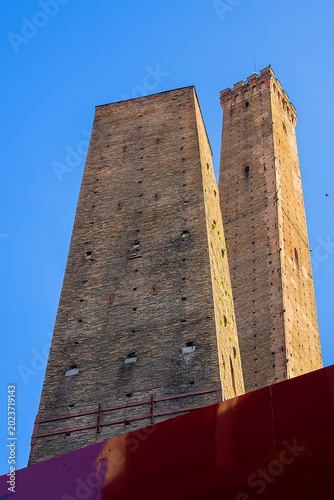 Two Towers (Due Torri, 1109 – 1119), symbols of medieval Bologna. The taller one is the Asinelli; the smaller, with a greater lean, is the Garisenda. BOLOGNA, ITALY.