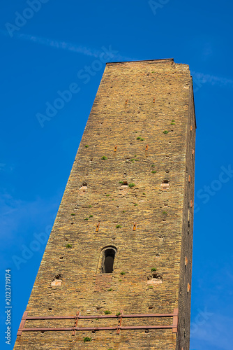 Two Towers (Due Torri, 1109 – 1119), symbols of medieval Bologna. The taller one is the Asinelli; the smaller, with a greater lean, is the Garisenda. BOLOGNA, ITALY.