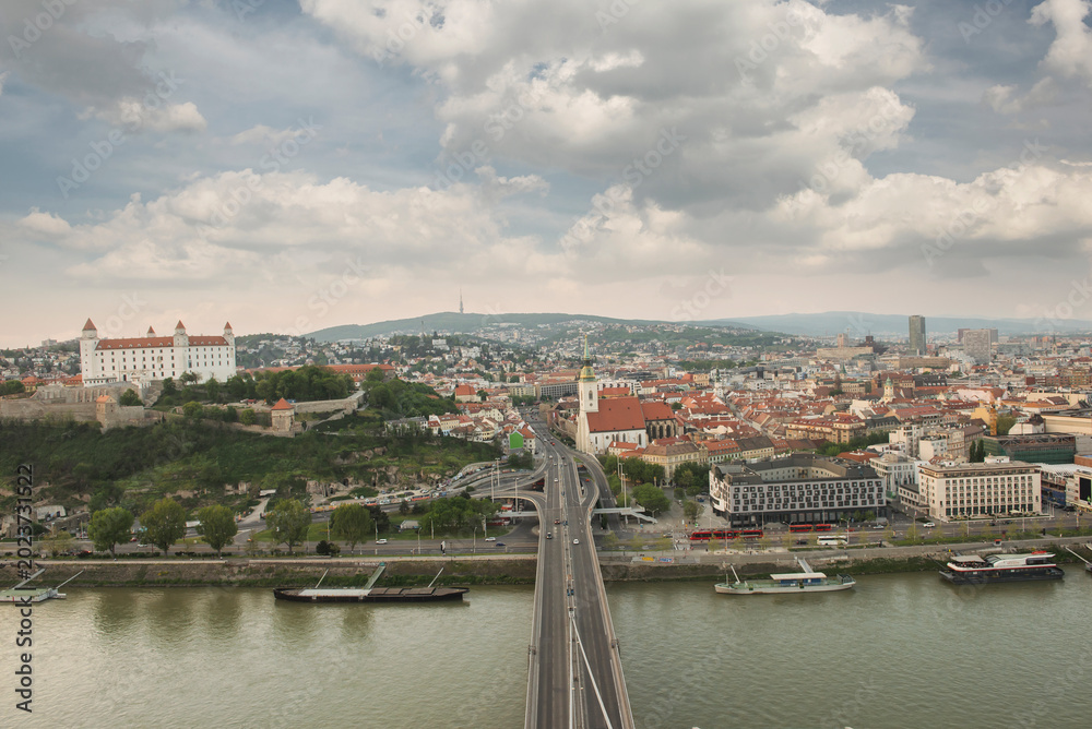 Obraz premium Aerial panoramic view of Bratislava cityscape with the castle, St. Martin's Cathedral, and Danube river