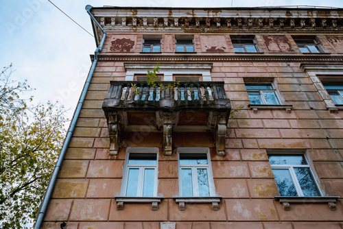 facade of an old, multi-story building with a distinct architectural style