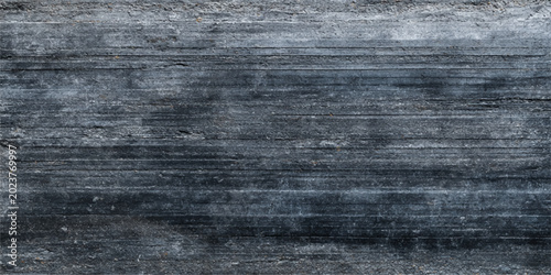 Tableau sur toile A dark blue grunge denim jeans texture and old rough brown wooden plank surface