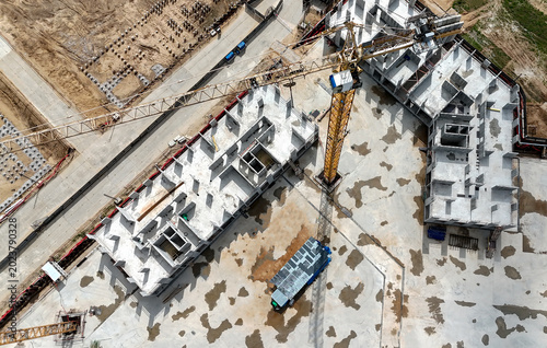 Canvastavla Aerial view of a construction site with unfinished buildings