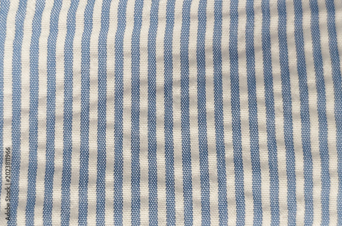Canvastavla macro texture of blue and white striped seersucker fabric