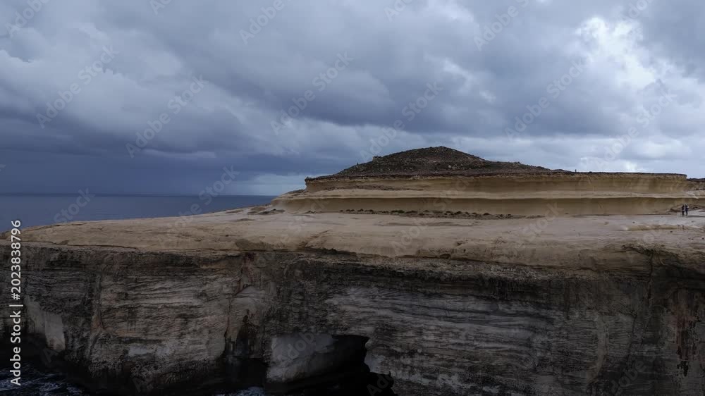 Sea cave under limestone cliffs Stock Video | Adobe Stock