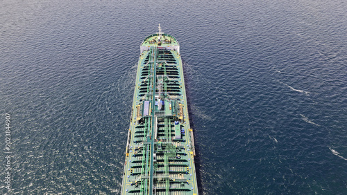 Fotografija Aerial drone photo of crude Oil tanker ship underway towards open sea, a merchan