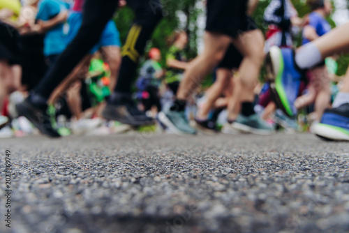 Canvas Print Marathon runners crowd, sportsmen participants start running the half-marathon i