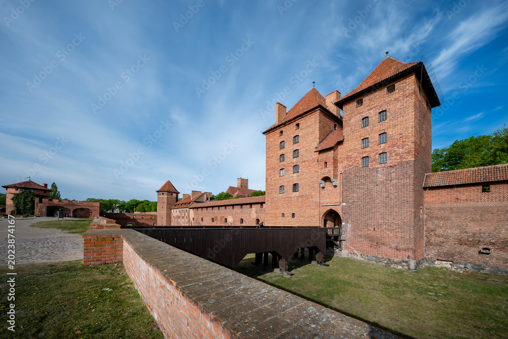 Fototapeta premium Malbork Castle, on the banks of the Nogat River. Malbork, Poland