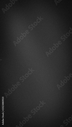 A vertical abstract grainy background backdrop with dark charcoal grey and black colors