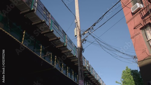 Handheld shot of an above ground subway train