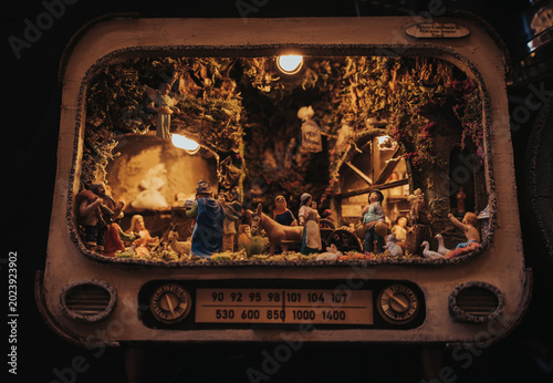 Traditional Neapolitan nativity scene built inside a vintage retro television casing in Naples Italy