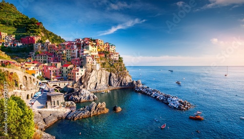 vertical virew of first city of cique terre sequence of hill cities riomaggiore bright morning view of liguria italy europe splendid seascape of mediterranean sea travel the world