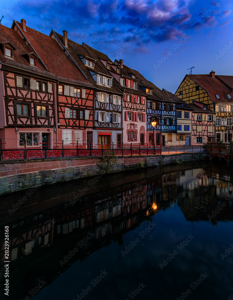 Obraz premium Half timbered houses by canals of Little Venice in Colmar, France