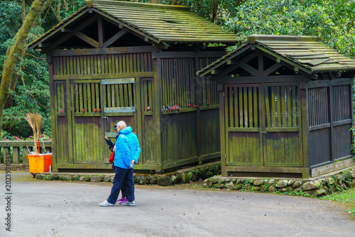 Man and Woman Walking in the Garden