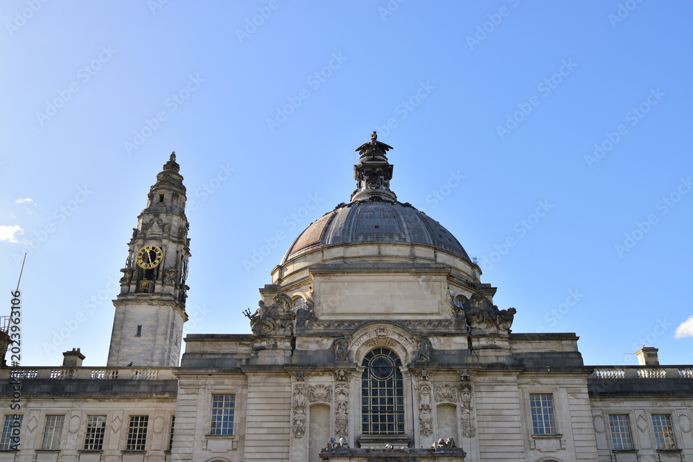Obraz premium Majestic Dome and Clock Tower Under Clear Sky